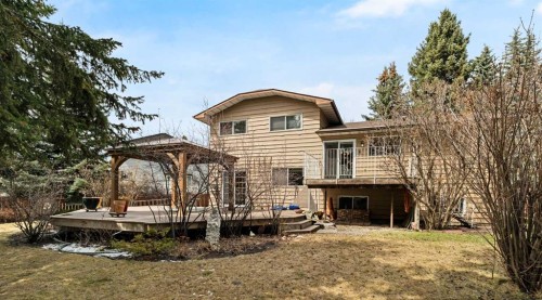 504 Suntree Place, Okotoks, AB - Outdoor With Deck Patio Veranda