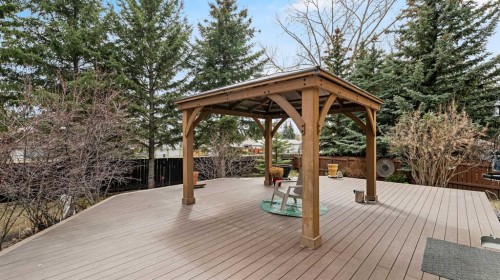 504 Suntree Place, Okotoks, AB - Outdoor With Deck Patio Veranda