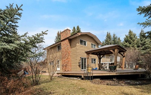 504 Suntree Place, Okotoks, AB - Outdoor With Deck Patio Veranda