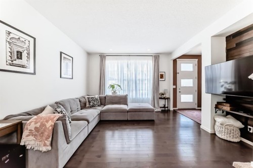 660 Walden Drive Se, Calgary, AB - Indoor Photo Showing Living Room