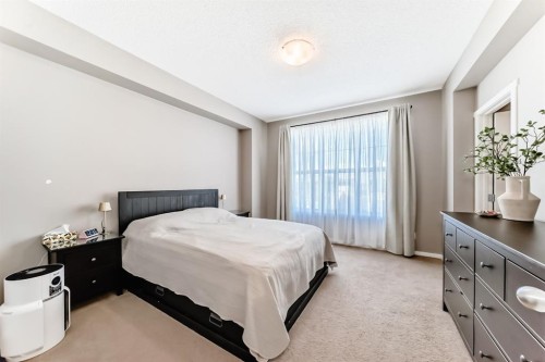 660 Walden Drive Se, Calgary, AB - Indoor Photo Showing Bedroom