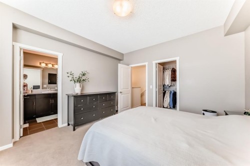 660 Walden Drive Se, Calgary, AB - Indoor Photo Showing Bedroom