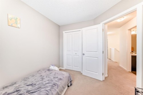 660 Walden Drive Se, Calgary, AB - Indoor Photo Showing Bedroom