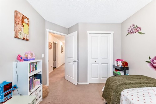 660 Walden Drive Se, Calgary, AB - Indoor Photo Showing Bedroom