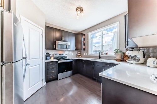 660 Walden Drive Se, Calgary, AB - Indoor Photo Showing Kitchen With Upgraded Kitchen