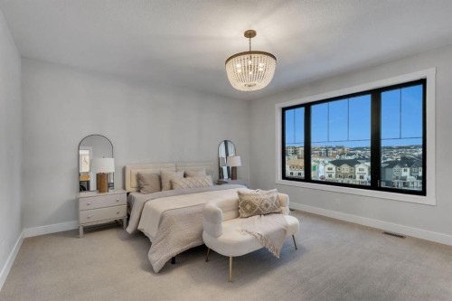 12 Spring Creek Point Sw, Calgary, AB - Indoor Photo Showing Bedroom
