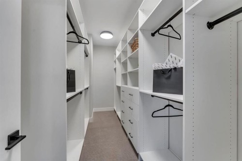 12 Spring Creek Point Sw, Calgary, AB - Indoor Photo Showing Other Room