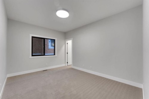 12 Spring Creek Point Sw, Calgary, AB - Indoor Photo Showing Other Room