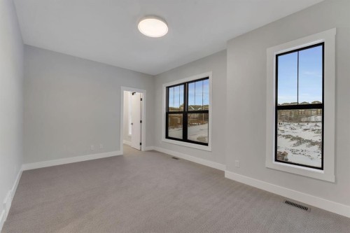 12 Spring Creek Point Sw, Calgary, AB - Indoor Photo Showing Other Room