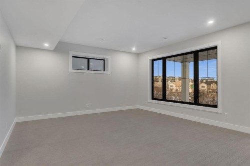 12 Spring Creek Point Sw, Calgary, AB - Indoor Photo Showing Other Room