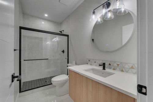 12 Spring Creek Point Sw, Calgary, AB - Indoor Photo Showing Bathroom