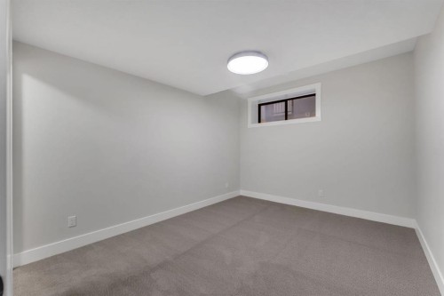 12 Spring Creek Point Sw, Calgary, AB - Indoor Photo Showing Other Room