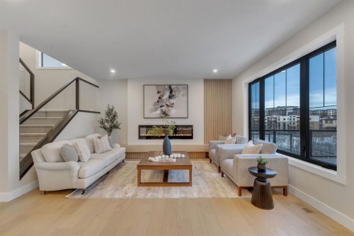 12 Spring Creek Point Sw, Calgary, AB - Indoor Photo Showing Living Room