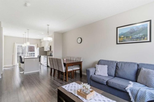 150 Copperpond Villas Se, Calgary, AB - Indoor Photo Showing Living Room