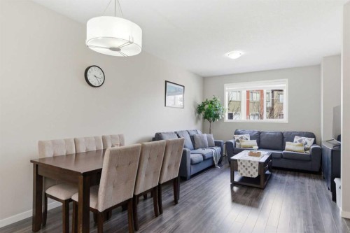 150 Copperpond Villas Se, Calgary, AB - Indoor Photo Showing Living Room
