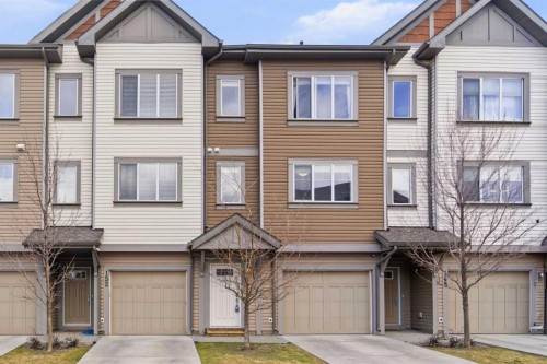 150 Copperpond Villas Se, Calgary, AB - Outdoor With Facade