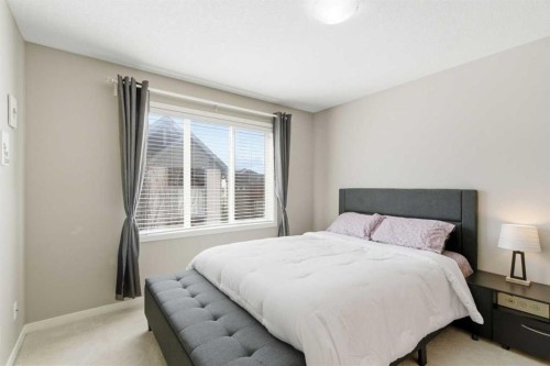 150 Copperpond Villas Se, Calgary, AB - Indoor Photo Showing Bedroom