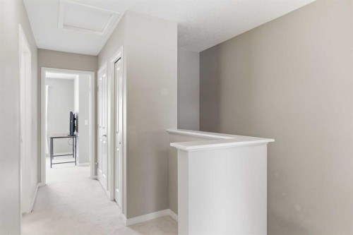 150 Copperpond Villas Se, Calgary, AB - Indoor Photo Showing Other Room