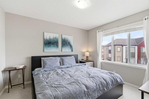 150 Copperpond Villas Se, Calgary, AB - Indoor Photo Showing Bedroom