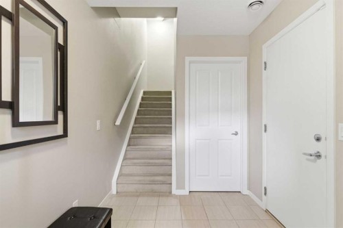 150 Copperpond Villas Se, Calgary, AB - Indoor Photo Showing Other Room