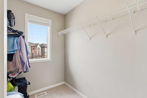 150 Copperpond Villas Se, Calgary, AB - Indoor With Storage