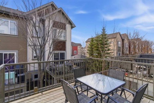 150 Copperpond Villas Se, Calgary, AB - Outdoor With Deck Patio Veranda With Exterior