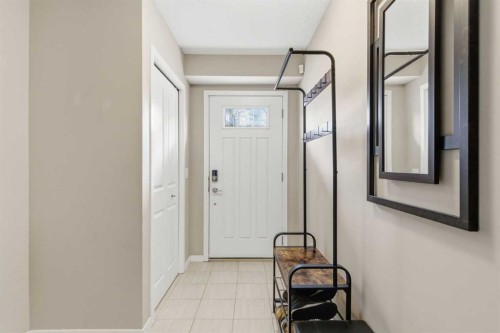 150 Copperpond Villas Se, Calgary, AB - Indoor Photo Showing Other Room