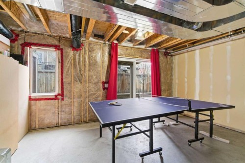 150 Copperpond Villas Se, Calgary, AB - Indoor Photo Showing Other Room