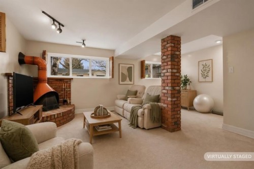 3816 Brighton Drive Nw, Calgary, AB - Indoor Photo Showing Other Room With Fireplace