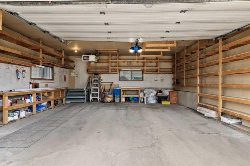 3816 Brighton Drive Nw, Calgary, AB - Indoor Photo Showing Garage