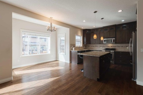 97 Aspenshire Drive Sw, Calgary, AB - Indoor Photo Showing Kitchen With Upgraded Kitchen