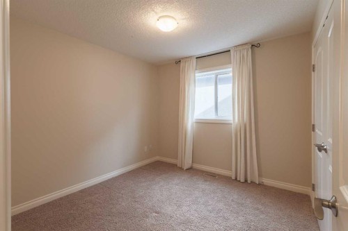 97 Aspenshire Drive Sw, Calgary, AB - Indoor Photo Showing Other Room
