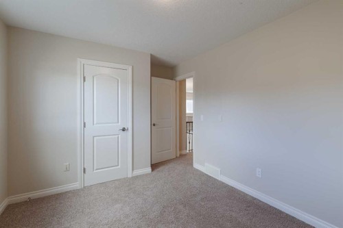 97 Aspenshire Drive Sw, Calgary, AB - Indoor Photo Showing Other Room