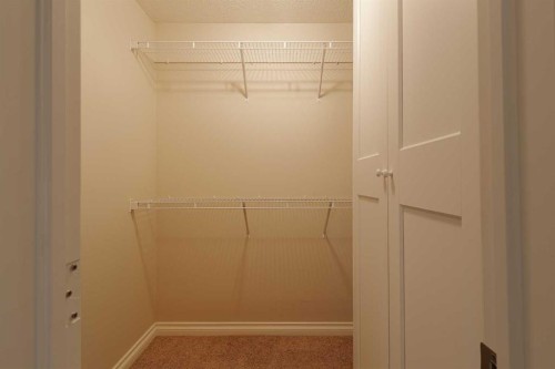 97 Aspenshire Drive Sw, Calgary, AB - Indoor With Storage