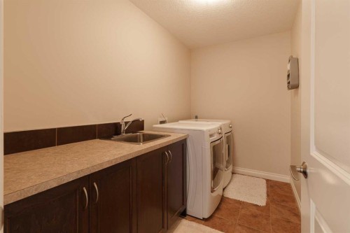 97 Aspenshire Drive Sw, Calgary, AB - Indoor Photo Showing Laundry Room
