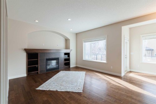 97 Aspenshire Drive Sw, Calgary, AB - Indoor Photo Showing Living Room With Fireplace