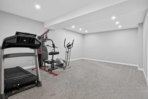 37 Evansfield Manor Nw, Calgary, AB - Indoor Photo Showing Gym Room