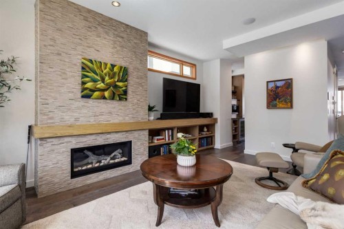 2138 28 Avenue Sw, Calgary, AB - Indoor Photo Showing Living Room With Fireplace