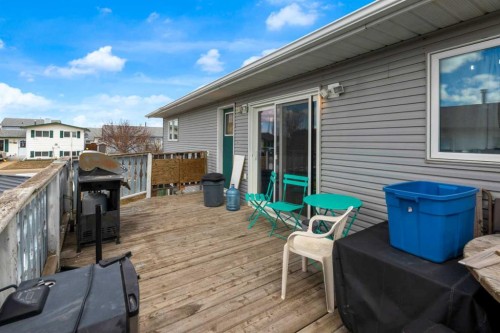 23 Beaver Place, Beiseker, AB - Outdoor With Deck Patio Veranda With Exterior