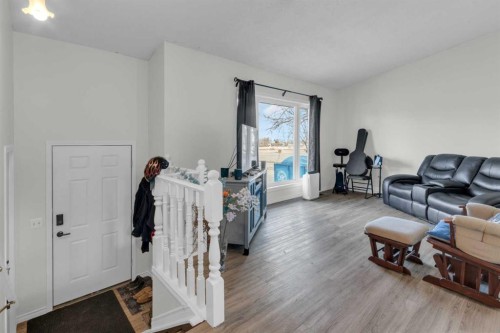 23 Beaver Place, Beiseker, AB - Indoor Photo Showing Living Room