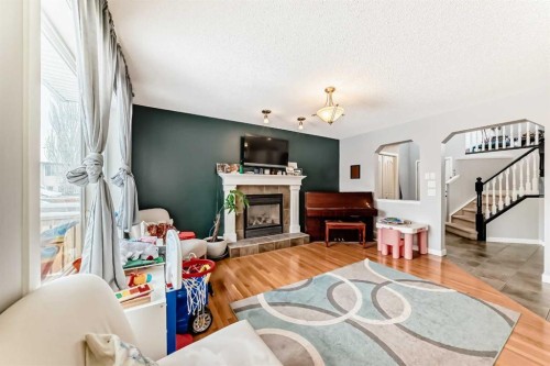 368 Cranfield Gardens Se, Calgary, AB - Indoor With Fireplace