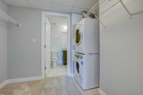 1609-930 6 Avenue Sw, Calgary, AB - Indoor Photo Showing Laundry Room