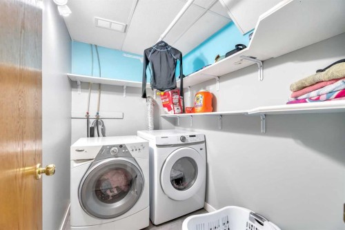 224B 5 Avenue, Strathmore, AB - Indoor Photo Showing Laundry Room