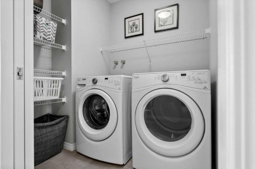 48 Walgrove Green Se, Calgary, AB - Indoor Photo Showing Laundry Room