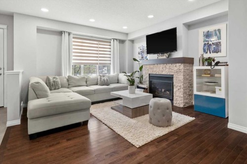 48 Walgrove Green Se, Calgary, AB - Indoor Photo Showing Living Room With Fireplace