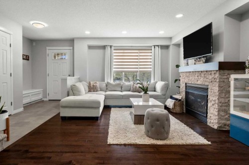 48 Walgrove Green Se, Calgary, AB - Indoor Photo Showing Living Room With Fireplace