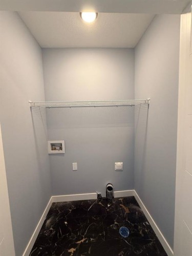 1995 Mccaskill Drive, Crossfield, AB - Indoor With Storage