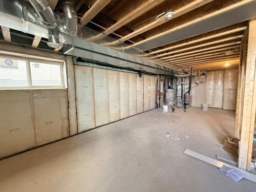 1995 Mccaskill Drive, Crossfield, AB - Indoor Photo Showing Basement