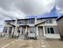 1995 Mccaskill Drive, Crossfield, AB  - Outdoor With Facade 