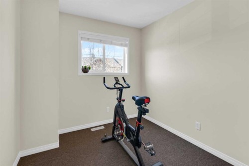 112 Ranch Ridge Meadow, Strathmore, AB - Indoor Photo Showing Gym Room